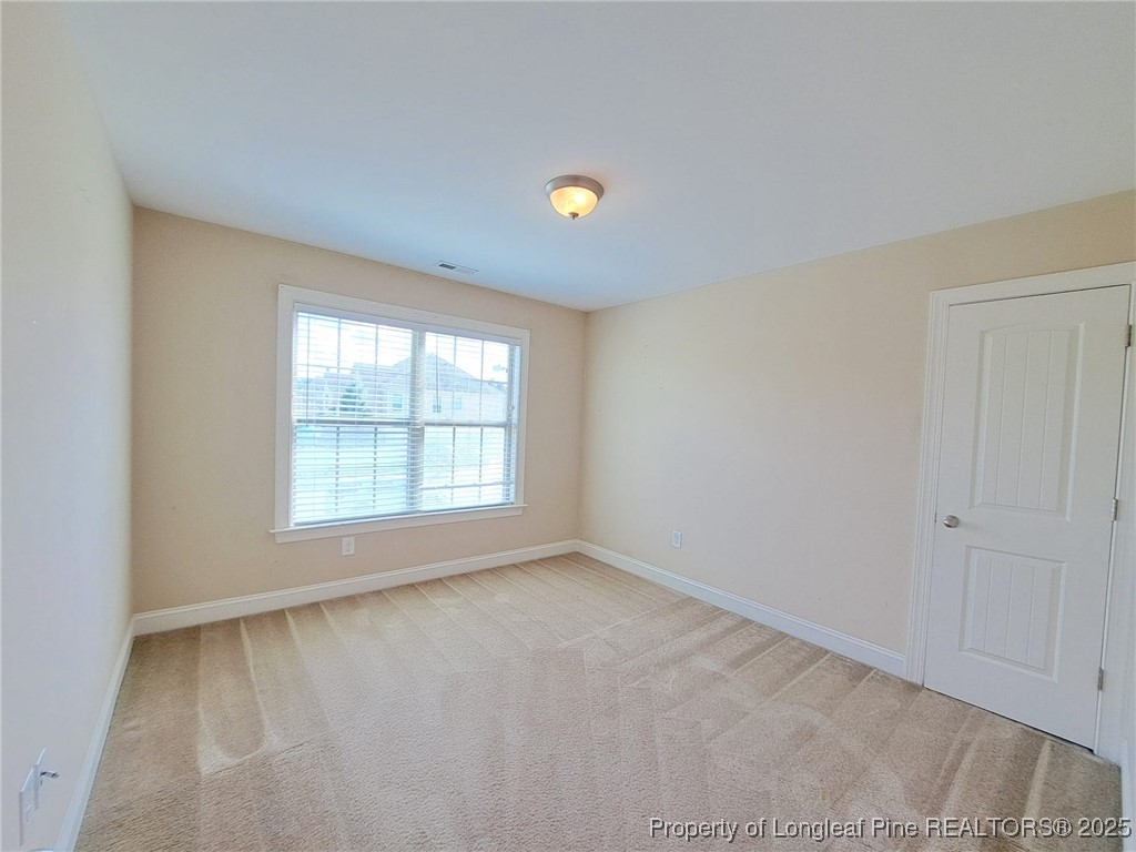30 Appomattox Drive Cameron, NC 28326 - Photo 17 of 22 a view of an empty room with a window