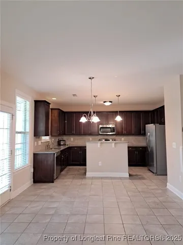 a kitchen with a cabinets and counter space
