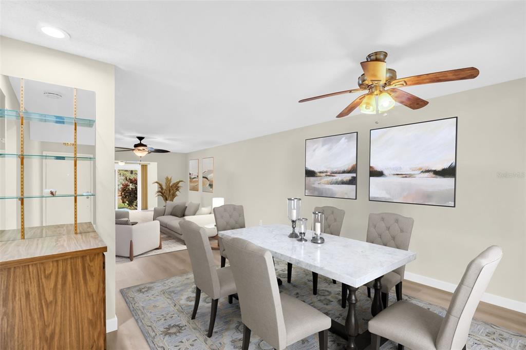 899 Cleland Court, Unit A Palm Harbor, FL 34684 - Photo 9 of 51 a view of a dining room with furniture window and outside view