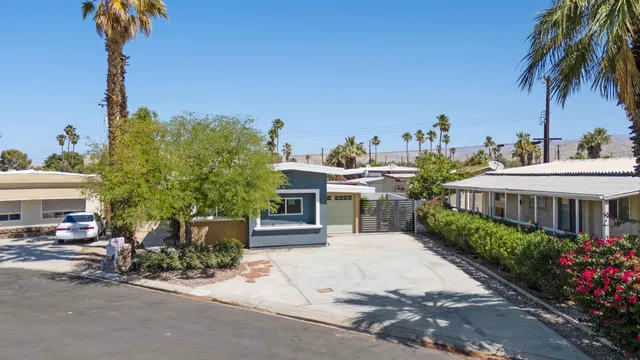 a kitchen with a sink stove and refrigerator