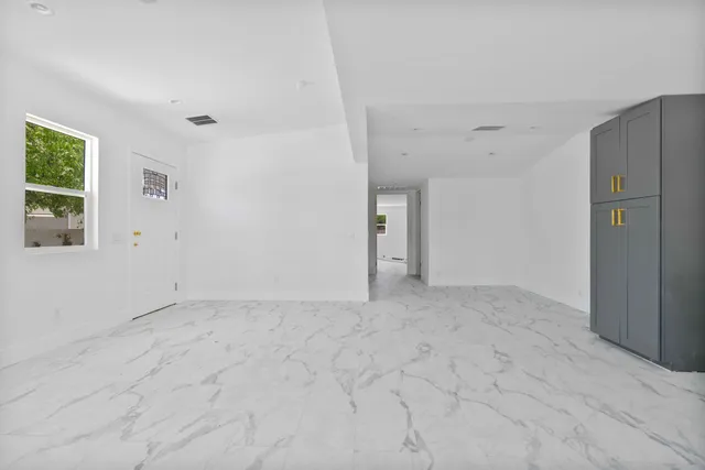 an empty room with windows