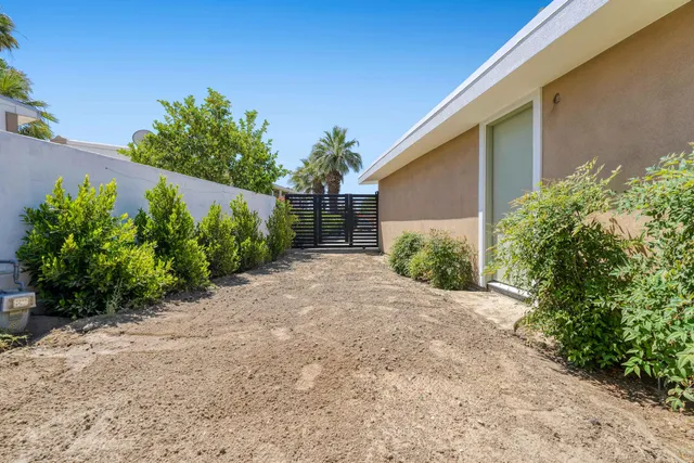 a house with trees in front of it