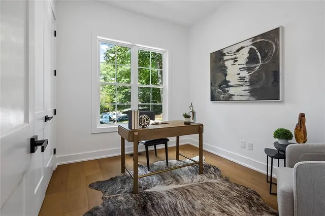 a workspace with furniture and a window