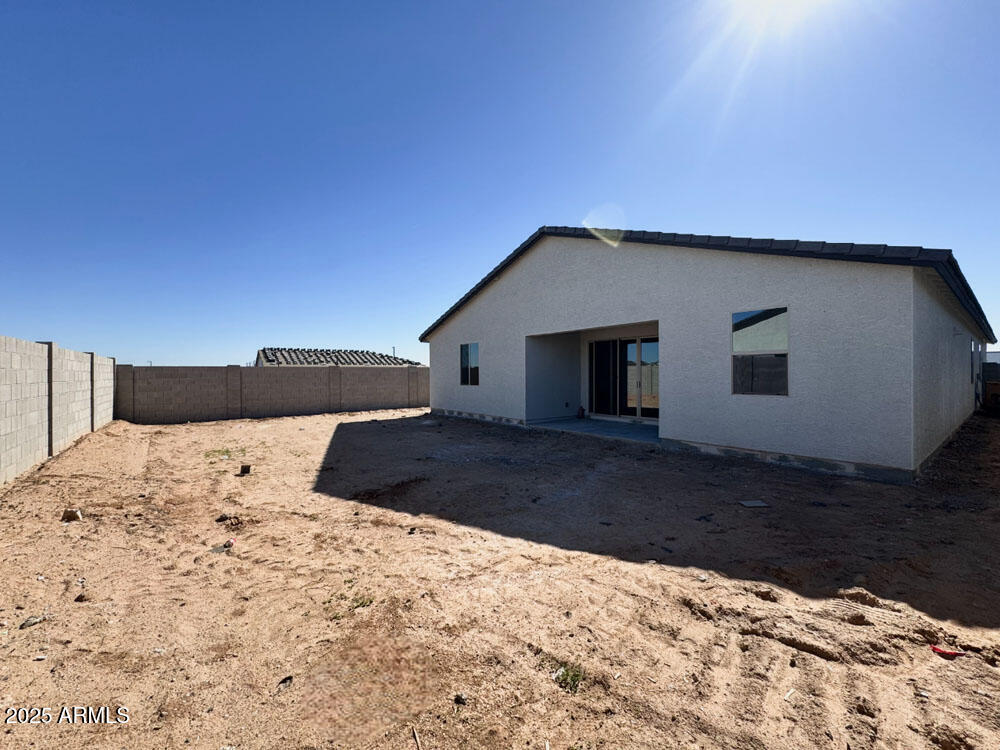 15714 West Brown Street Waddell, AZ 85355 - Photo 17 of 36 a backyard of a house