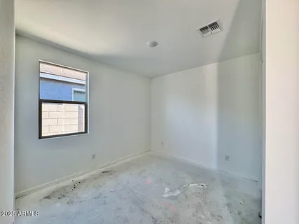 a view of a room that has a window in it