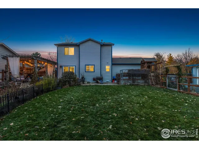 a view of a chairs and table in patio