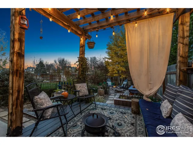 a backyard of a house with seating space