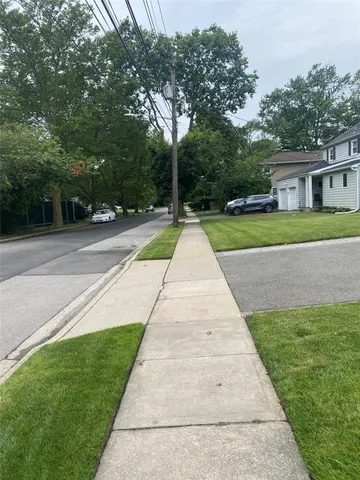 a view of backyard with green space