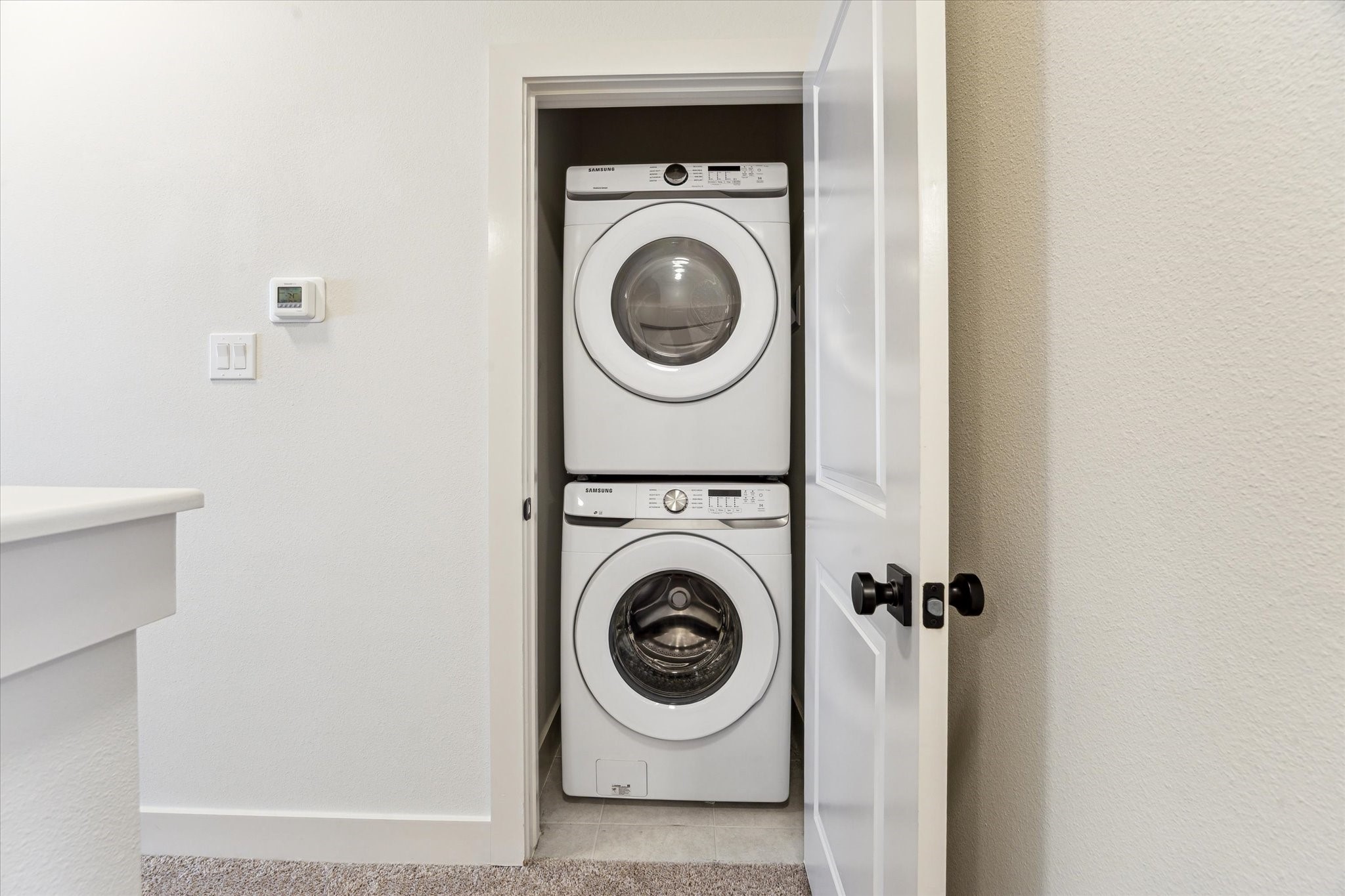 4155 Griggs Road Houston, TX 77021 - Photo 16 of 17 Second-floor full-size stackable washer and dryer for convenient laundry.