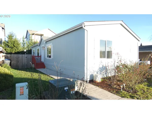 a black and white photo of a house