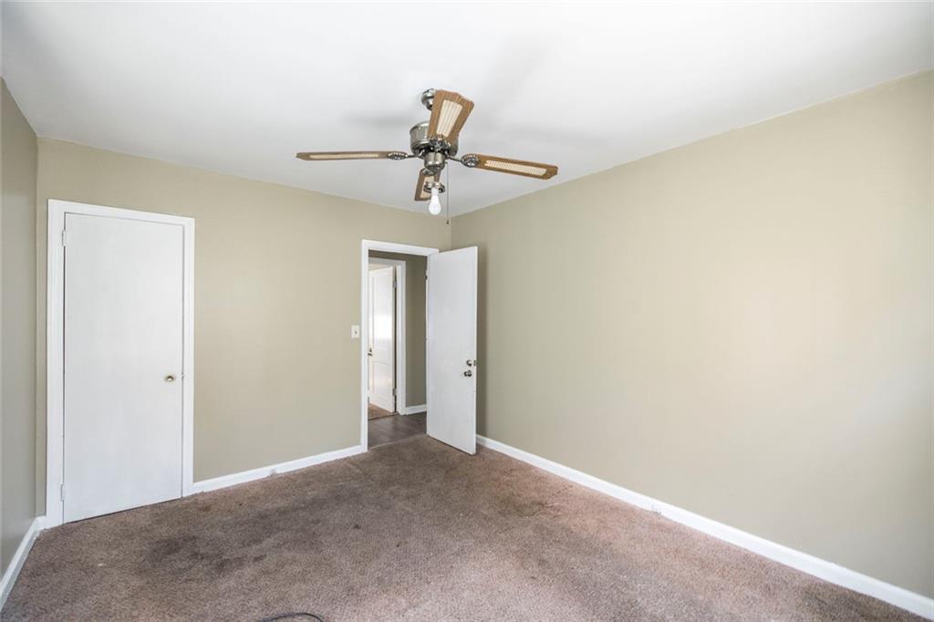 3260 Toole Drive Macon, GA 31204 - Photo 21 of 26 a view of a chandelier fan in a room