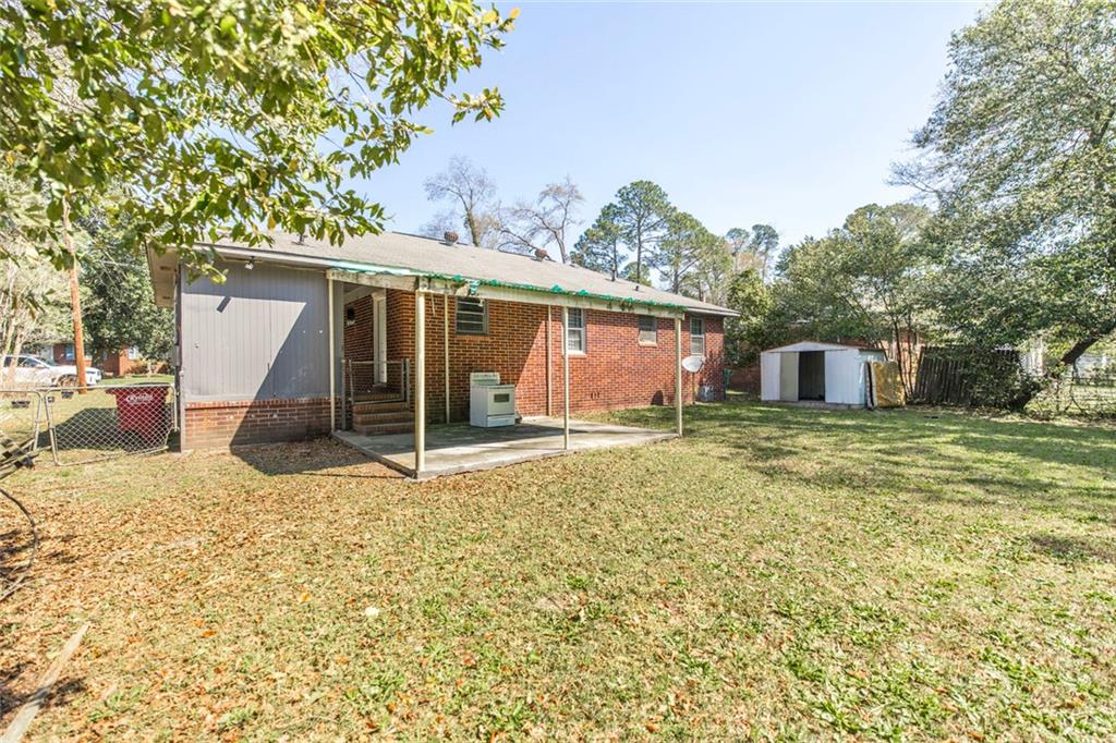 3260 Toole Drive Macon, GA 31204 - Photo 23 of 26 a house view with a backyard space