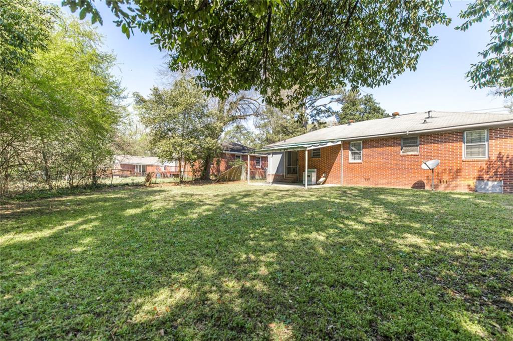 3260 Toole Drive Macon, GA 31204 - Photo 25 of 26 a front view of house with yard and green space