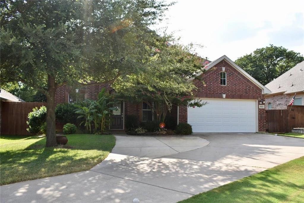 3821 Sandlin Street Grapevine, TX 76092 - Photo 1 of 26 a front view of a house with a yard and garage