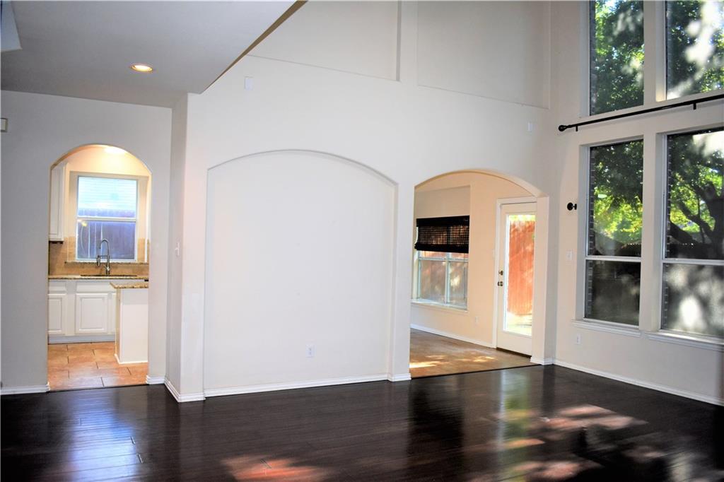 3821 Sandlin Street Grapevine, TX 76092 - Photo 12 of 26 a view of empty room with wooden floor and fan