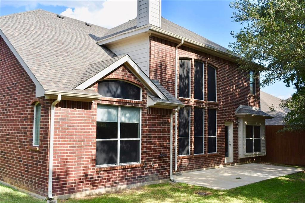 3821 Sandlin Street Grapevine, TX 76092 - Photo 23 of 26 a view of house with yard