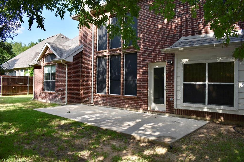 3821 Sandlin Street Grapevine, TX 76092 - Photo 24 of 26 a view of a house with a yard