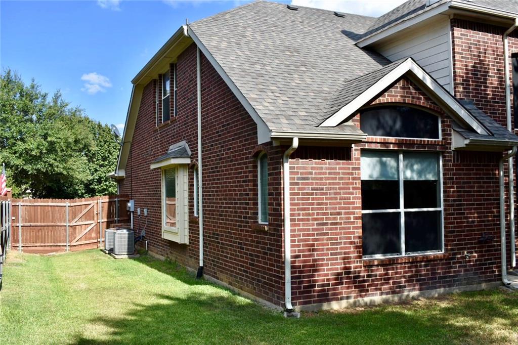 3821 Sandlin Street Grapevine, TX 76092 - Photo 25 of 26 a front view of a house with a yard