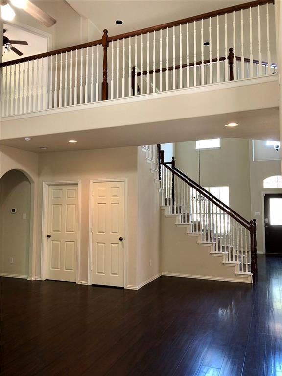 3821 Sandlin Street Grapevine, TX 76092 - Photo 9 of 26 a hallway with wooden floor in front door