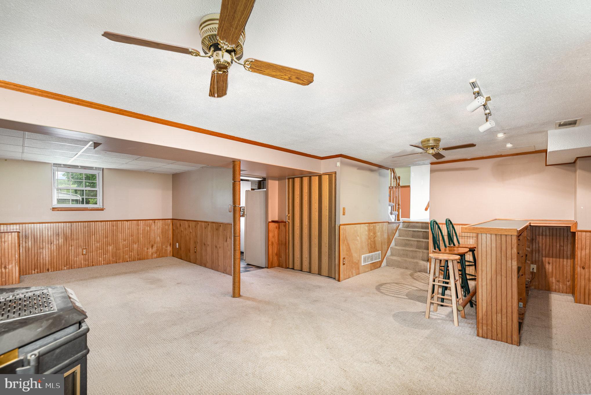 9005 Fieldchat Road Baltimore, MD 21236 - Photo 21 of 31 a view of empty room with wooden floor