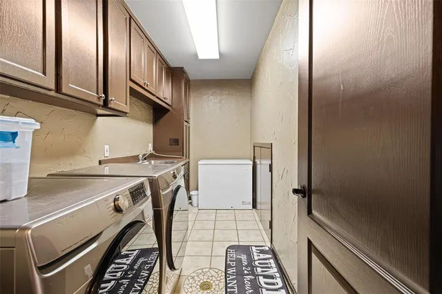 a view of a kitchen with an empty space and a window