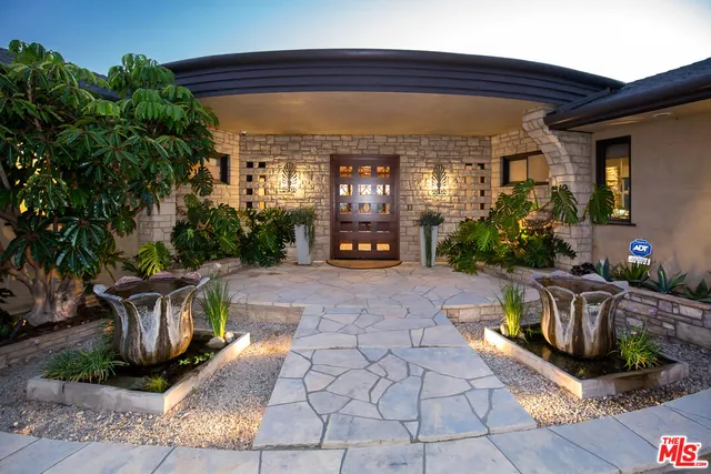 a view of a porch with furniture