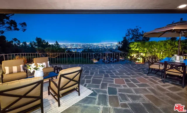 a outdoor sitting area with a couch