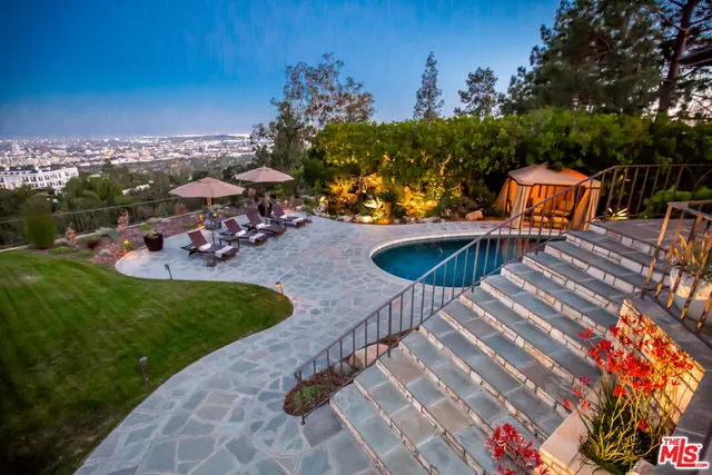 an outdoor space with furniture