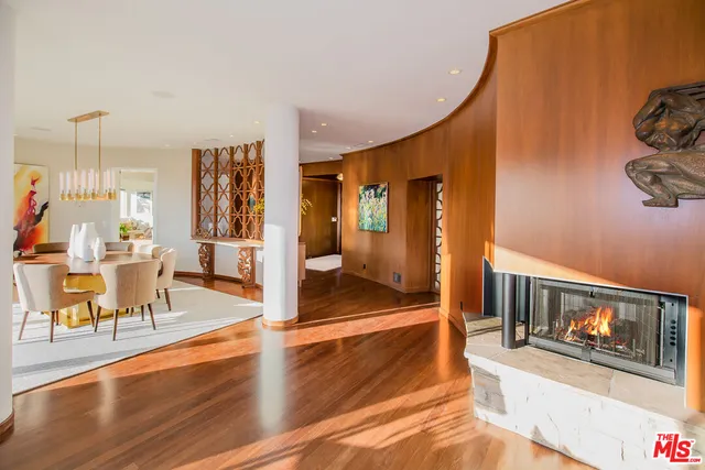 a view of a living room and hardwood floor