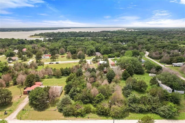 a view of a city with mountains in the background