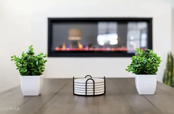 a view of a vase of flowers sitting on a table