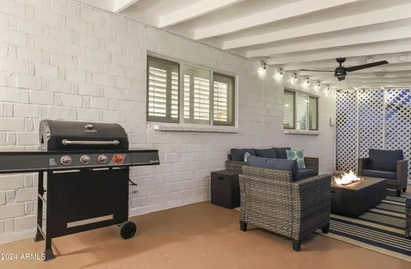 a kitchen with granite countertop cabinets and window