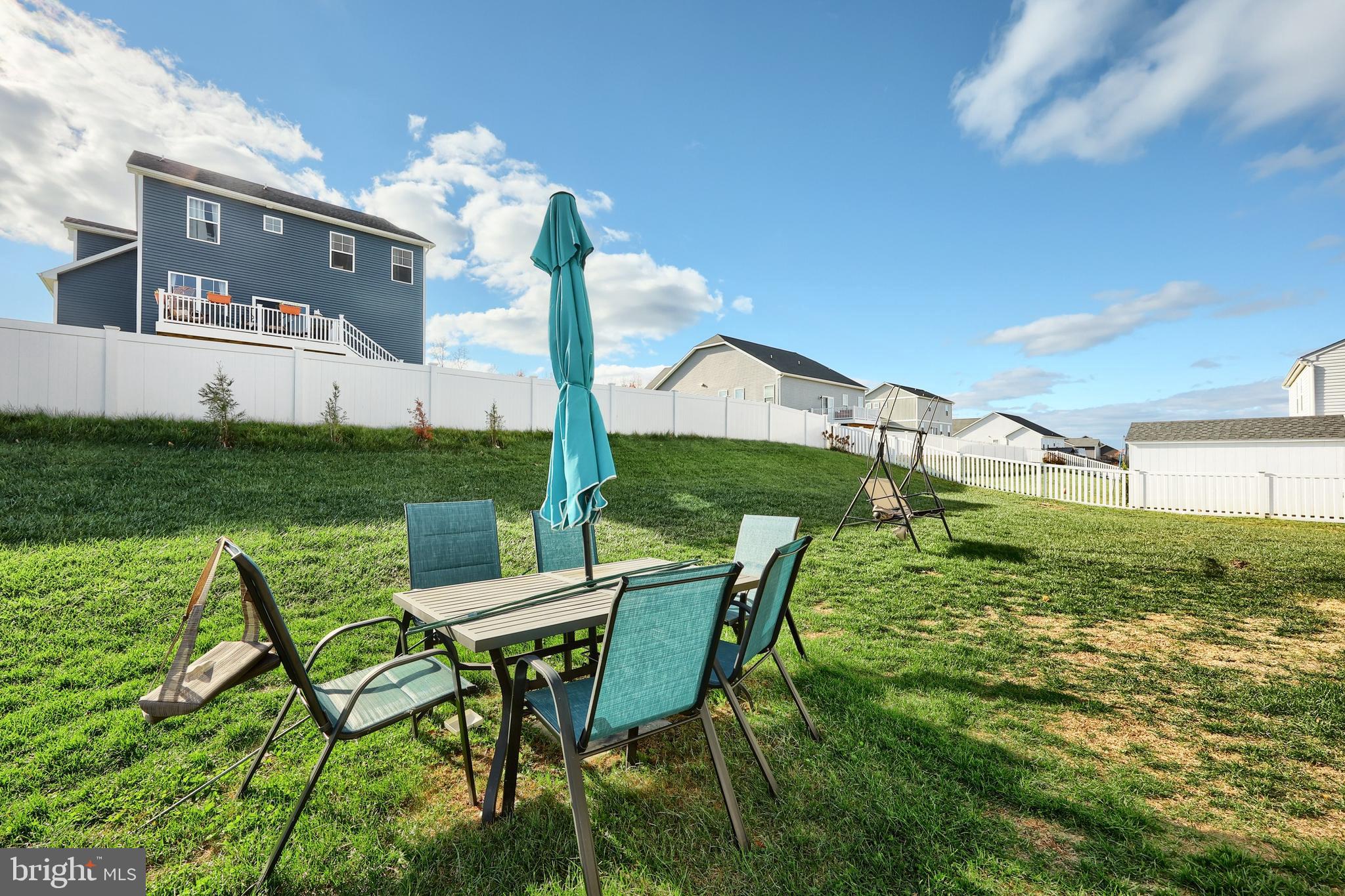 90 Knobby Hook Drive Hanover, PA 17331 - Photo 14 of 48 a view of an chairs and table in the garden