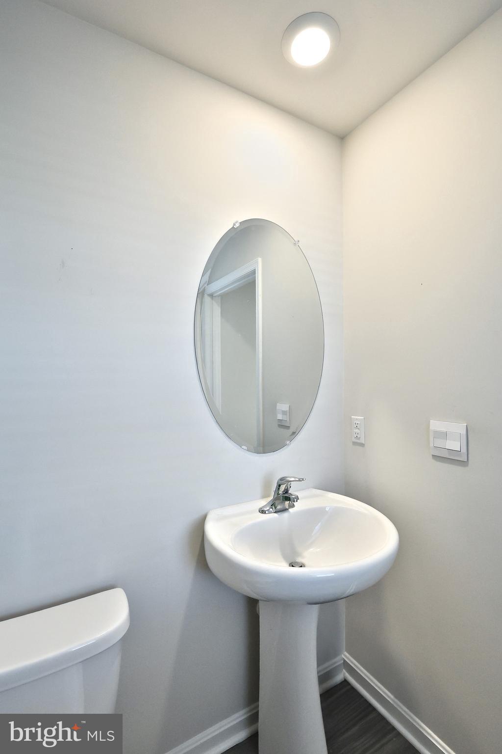 90 Knobby Hook Drive Hanover, PA 17331 - Photo 23 of 48 a bathroom with a toilet sink and mirror