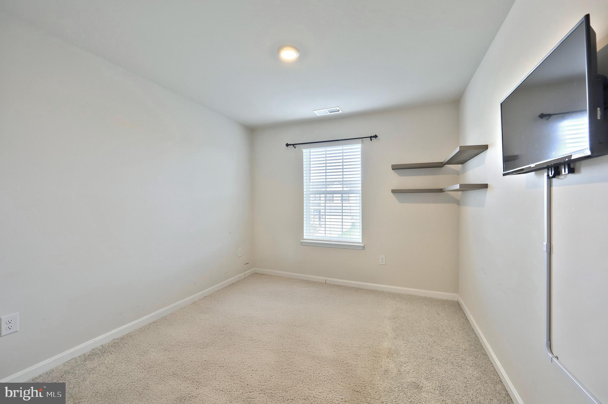 90 Knobby Hook Drive Hanover, PA 17331 - Photo 35 of 48 an empty room with a empty space and a window