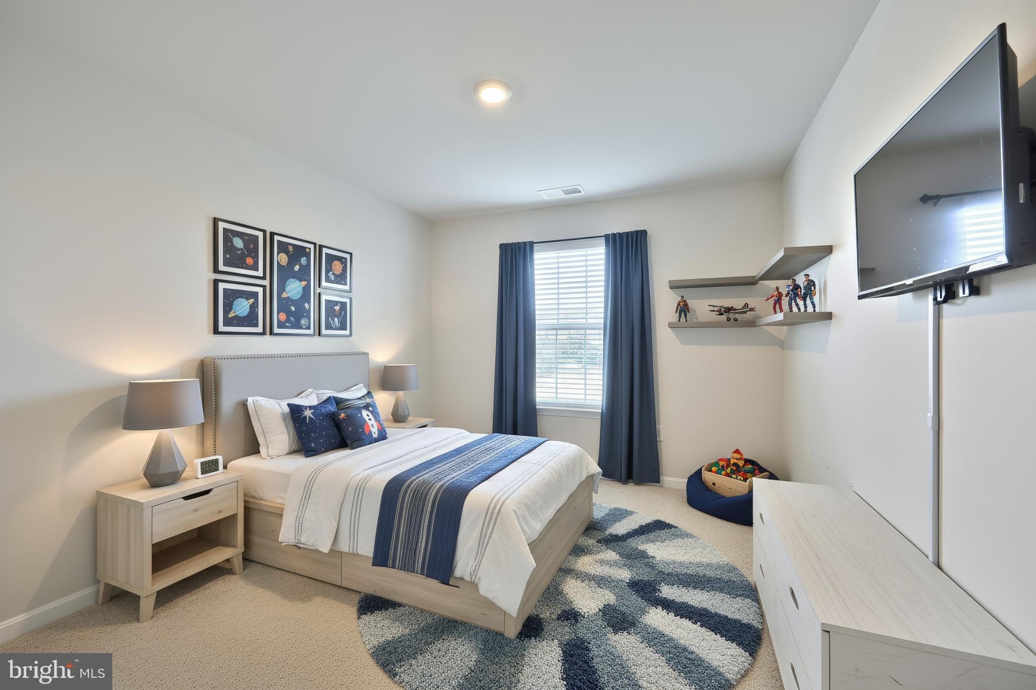 90 Knobby Hook Drive Hanover, PA 17331 - Photo 36 of 48 a bedroom with a bed and a flat screen tv