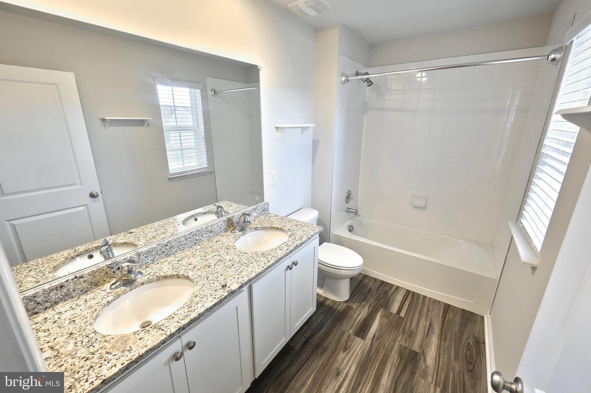 90 Knobby Hook Drive Hanover, PA 17331 - Photo 37 of 48 a bathroom with a granite countertop sink toilet and shower