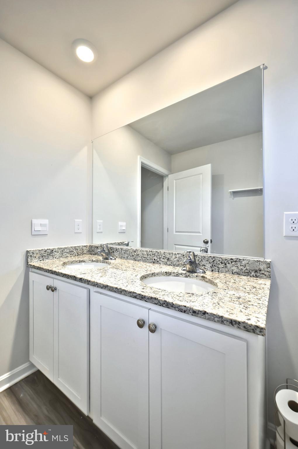 90 Knobby Hook Drive Hanover, PA 17331 - Photo 39 of 48 a bathroom with a granite countertop sink and a mirror