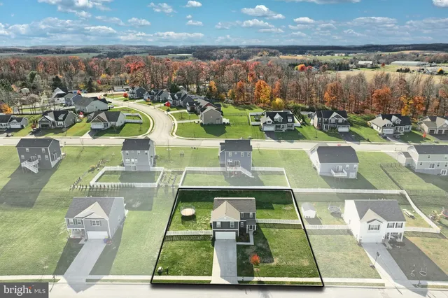 a view of swimming pool with outdoor seating