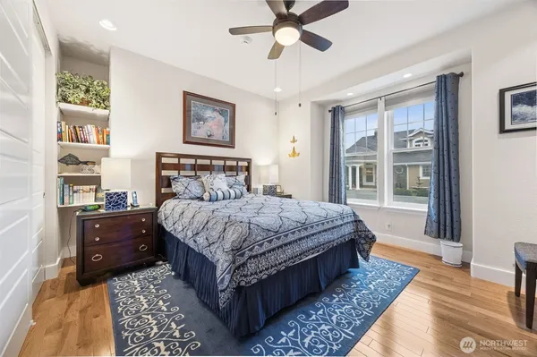 a bedroom with a bed and dresser