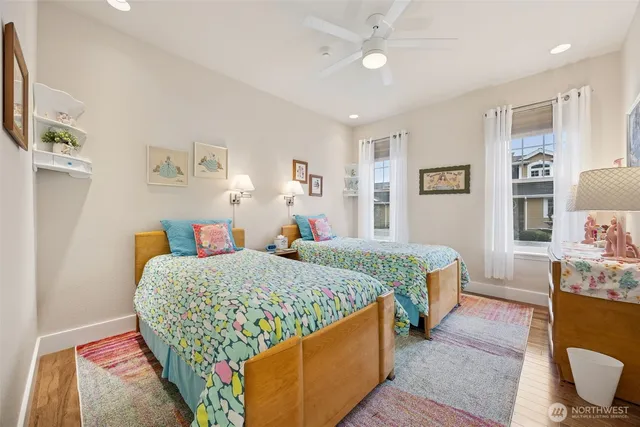 an aerial view of a house with yard and street view