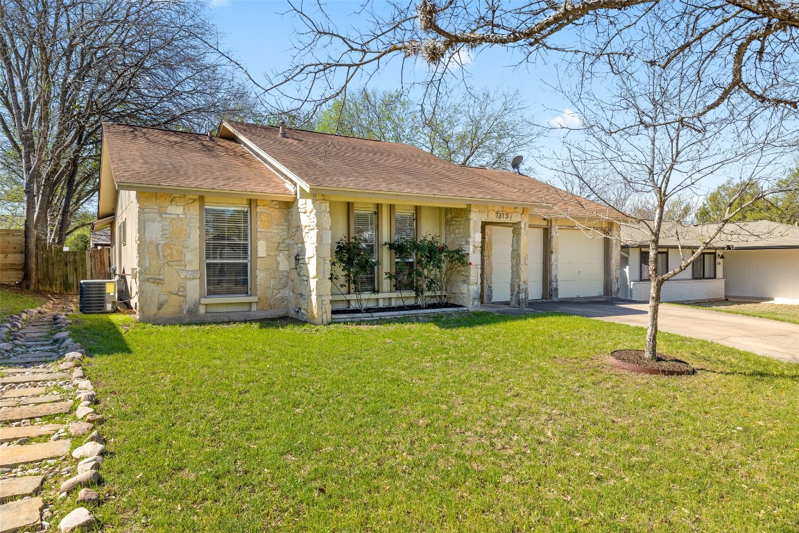 a backyard of a house with garden