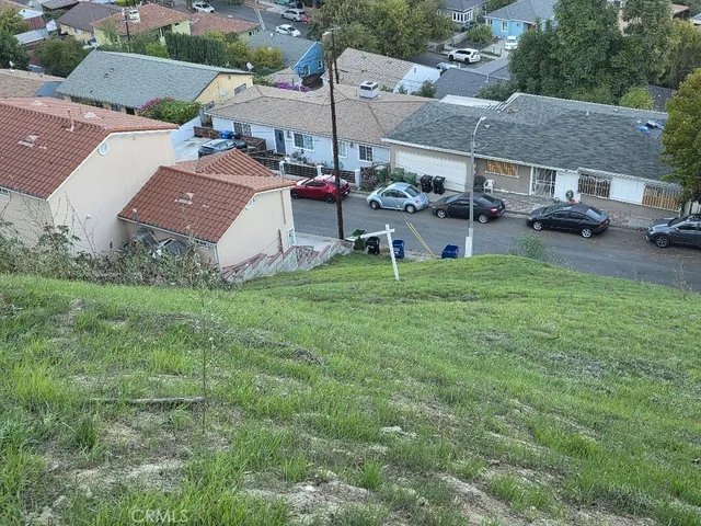 an aerial view of a house with garden