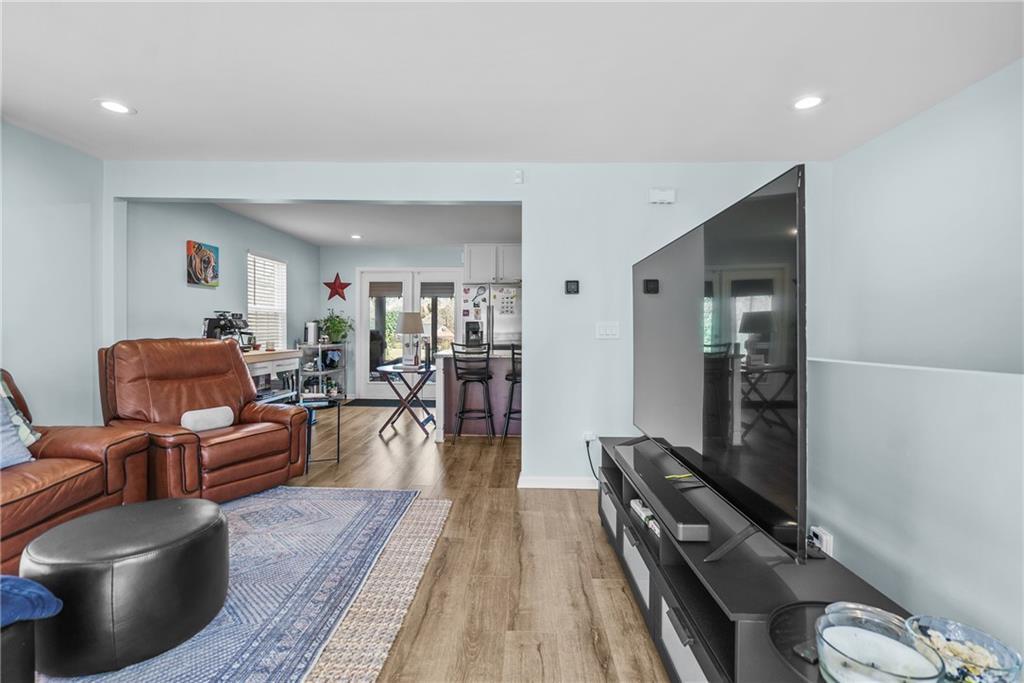 2444 Constance Street Atlanta, GA 30344 - Photo 12 of 39 a living room with furniture and a wooden floor