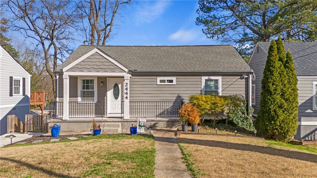 2444 Constance Street Atlanta, GA 30344 - Photo 2 of 39 a front view of a house with garden