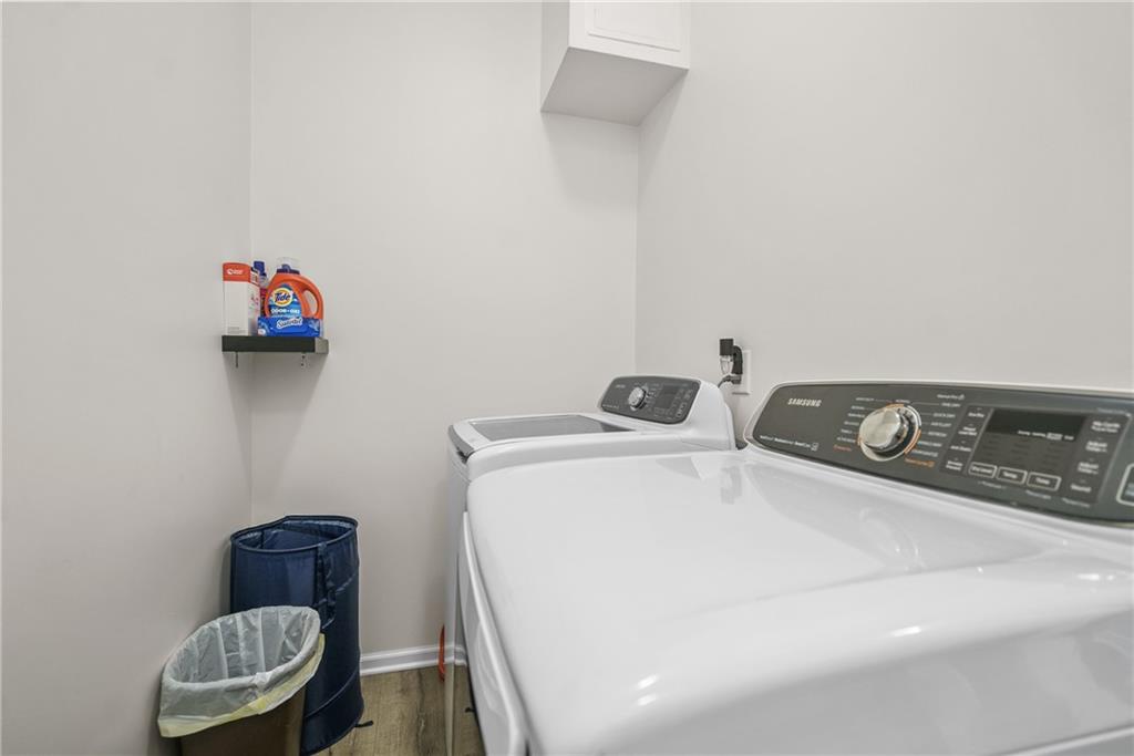 2444 Constance Street Atlanta, GA 30344 - Photo 22 of 39 a utility room with a sink a couch and a window