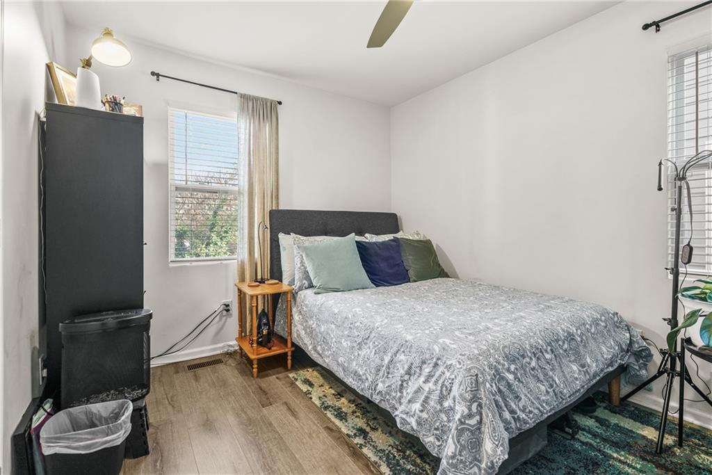 2444 Constance Street Atlanta, GA 30344 - Photo 23 of 39 a bedroom with a bed and a mirror