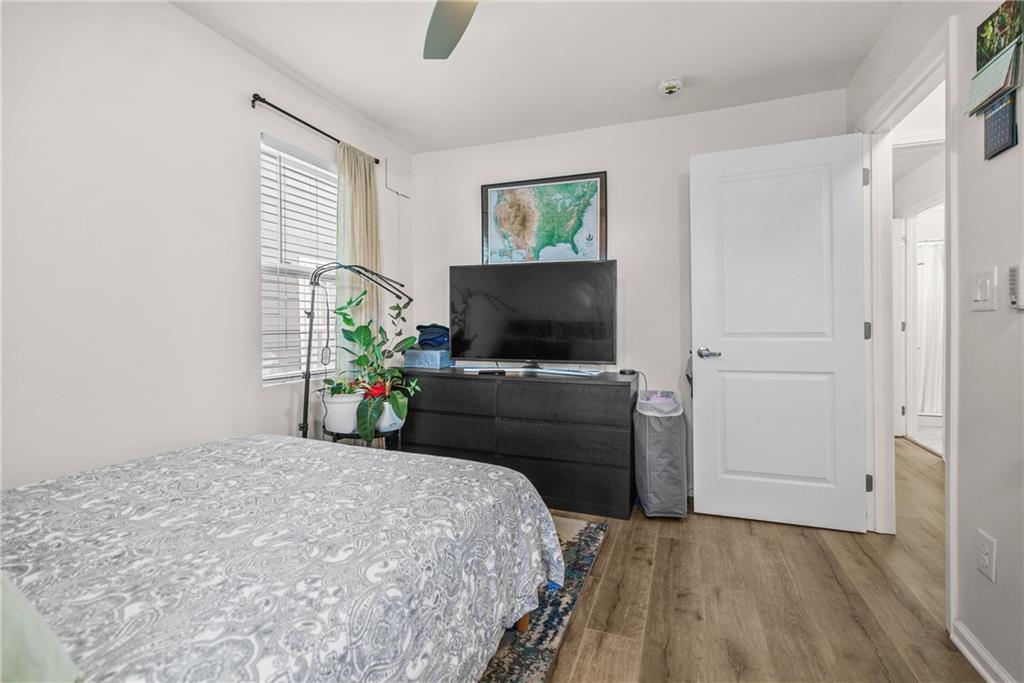 2444 Constance Street Atlanta, GA 30344 - Photo 24 of 39 a bedroom with a bed and a flat screen tv