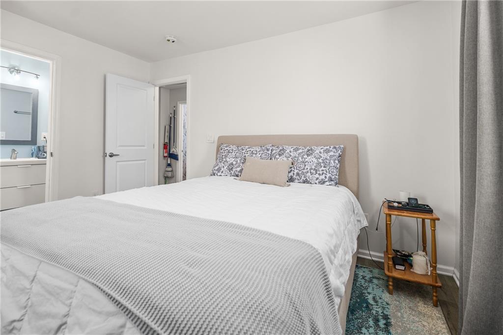 2444 Constance Street Atlanta, GA 30344 - Photo 25 of 39 a bedroom with a bed and a tv