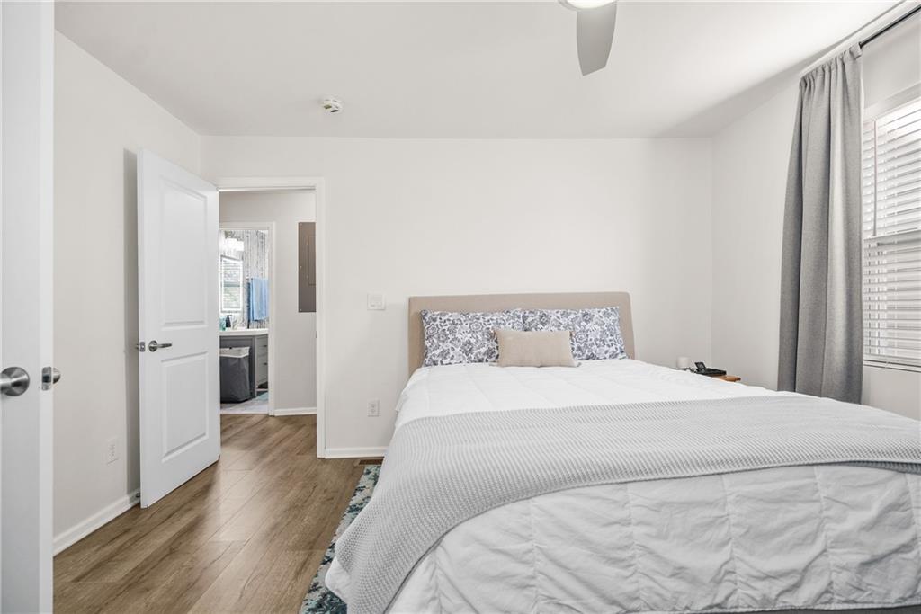 2444 Constance Street Atlanta, GA 30344 - Photo 26 of 39 a large white bed in a small room